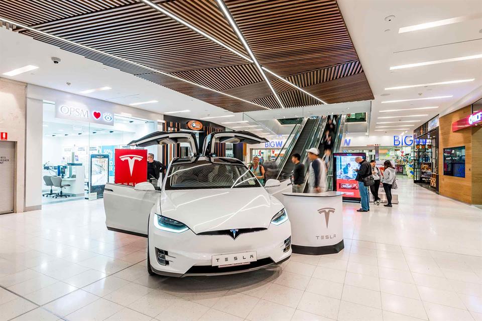 Front of Tesla car with front doors open